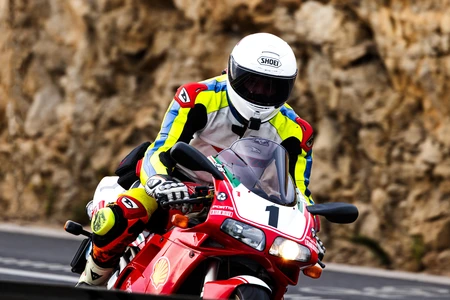 Motorcyclist on a Curvy Road
