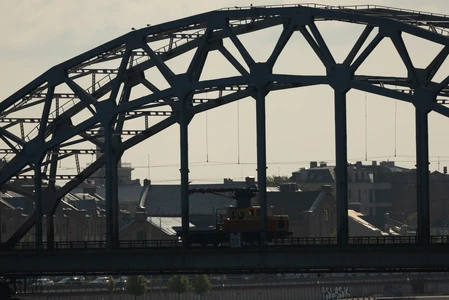 Silhouette of Bridge in Cityscape
