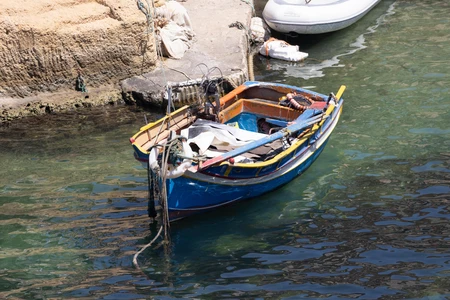 Colorful Boat Docked by the Sea