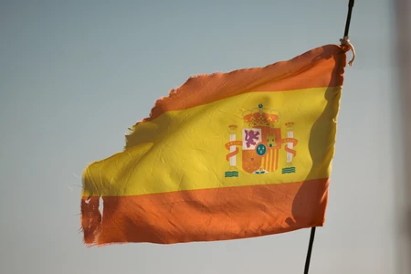 Worn Spanish Flag in the Wind