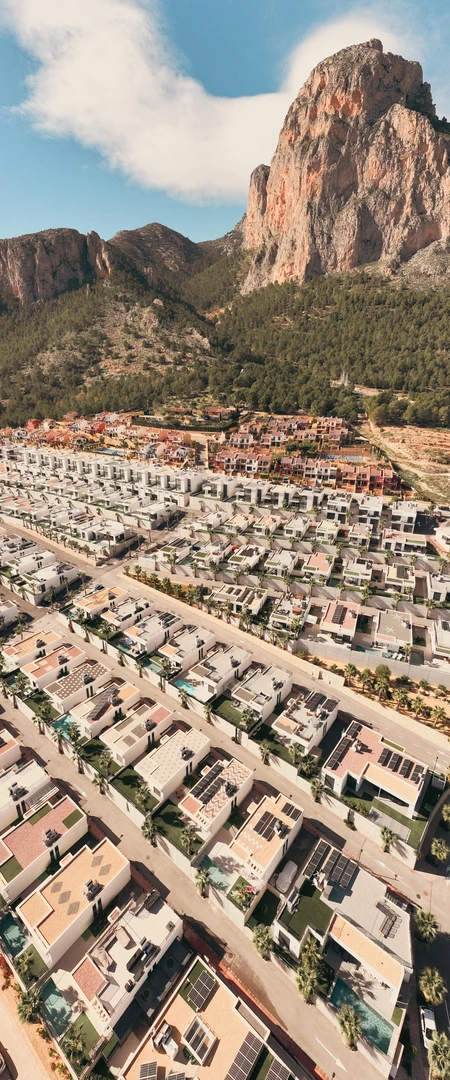 Aerial View of Residential Area near Mountain