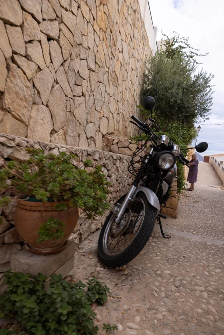 Rustic Alley with Motorcycle