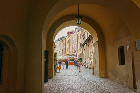 Charming Archway Leading to a Historic Street