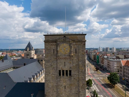 Clock Tower Overlooking City Street