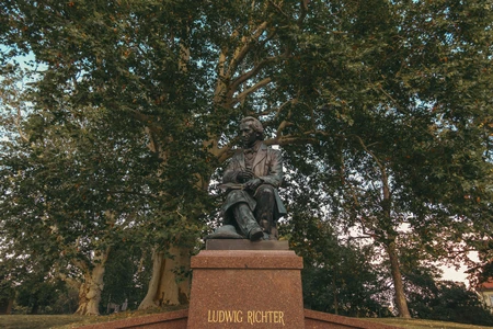 Statue Under the Trees