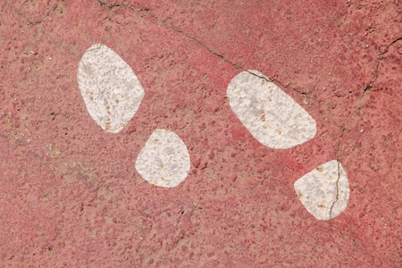 Red Textured Wall with White Marks