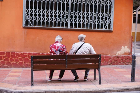 Elderly Couple on a Bench