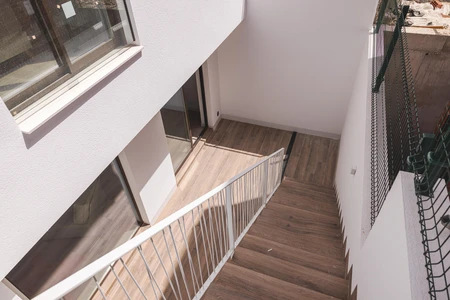 Modern Staircase in Sunlit Interior