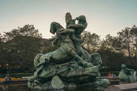 Statue in Park at Dusk