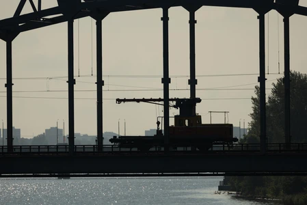 Silhouette of a Train on a Bridge