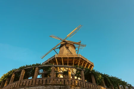 Historic Windmill Under Blue Sky