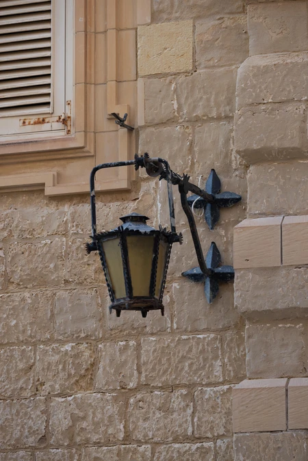 Rustic Lantern on Stone Wall