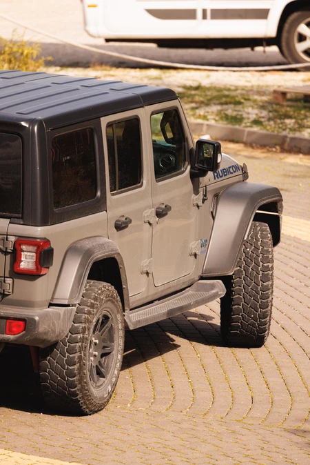 Off-Road Vehicle on Paved Road