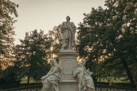 Statue in a Park at Sunset
