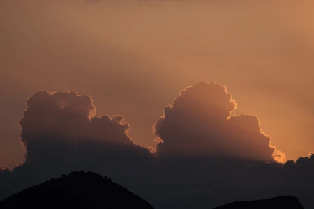 Sunset Behind Clouds