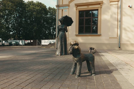 Statue and Dog Sculpture