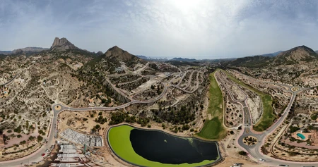 Mountainous Landscape and Coastal Cityscape
