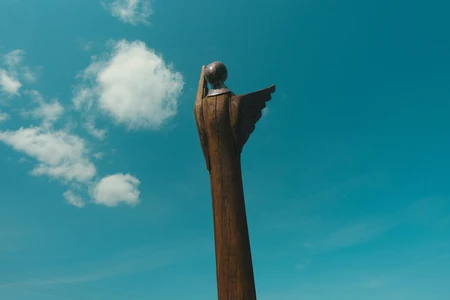 Sculpture Under Blue Sky