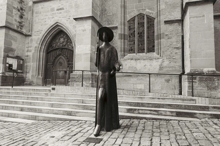 Statue Near Historic Building