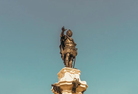 Majestic Statue Against Blue Sky