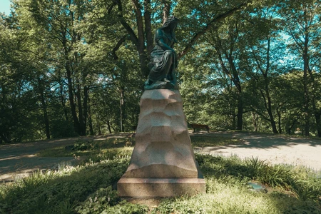 Statue in a Sunlit Park