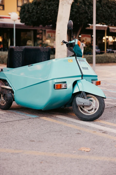 Turquoise Scooter in Urban Setting