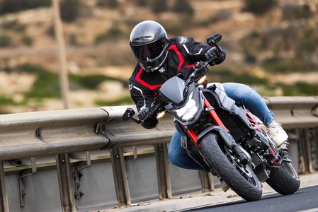 Motorcyclist on Curved Road