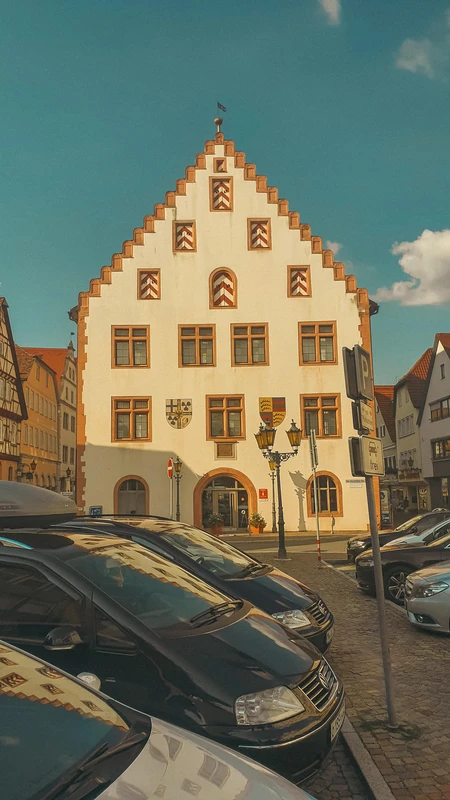Historic Building with Parked Cars