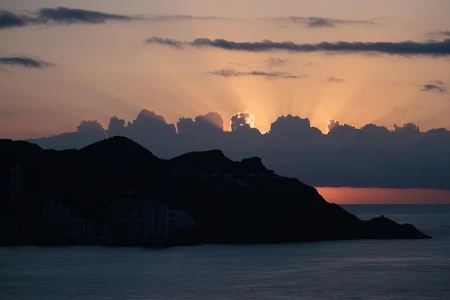 Sunset Over Mountain Silhouette