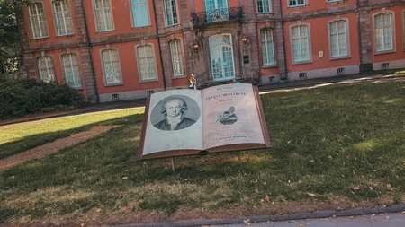 Historic Building with Open Book Sculpture