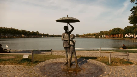 Lakeside Sculpture Under Umbrella