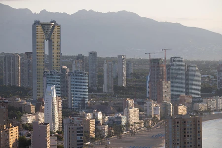 Cityscape with Mountain Backdrop