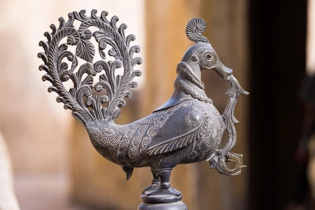 Intricate Metal Bird Sculpture