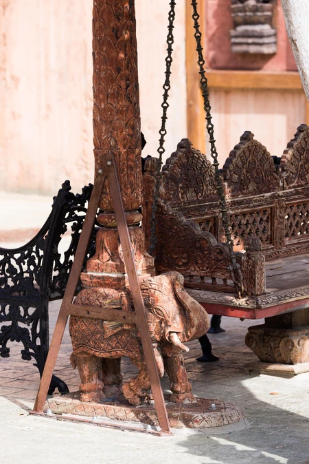 Intricately Carved Swing Structure