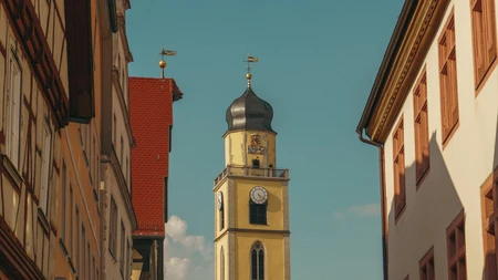 Clock Tower amidst City Buildings