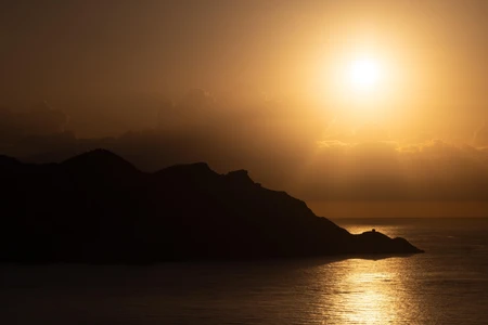 Sunset Over Mountain Silhouette