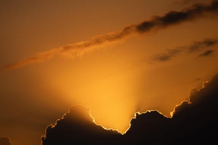 Sunset Behind Clouds