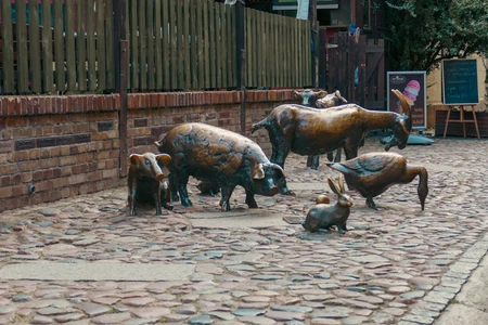Animal Sculptures on Cobblestone Path