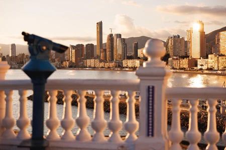 Sunlit Cityscape by the Sea