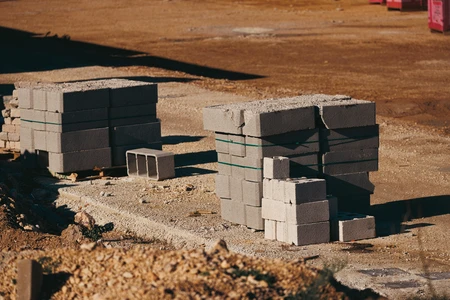 Construction Site with Stacked Concrete Blocks