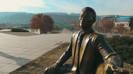 Bronze Statue in Urban Park