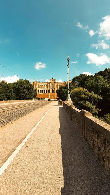 Historic Building with Tree-Lined Path