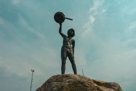 Statue on a Rocky Outcrop