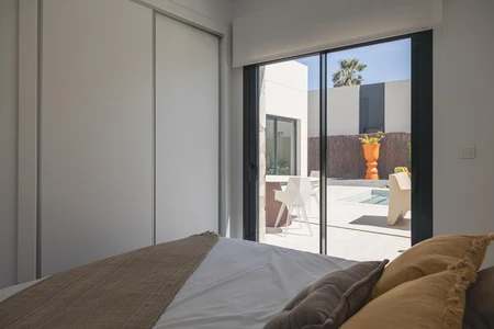 Modern Bedroom with Patio View