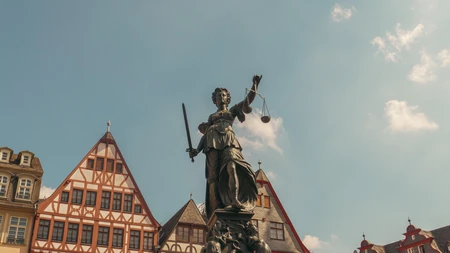 Statue with Historic Architecture