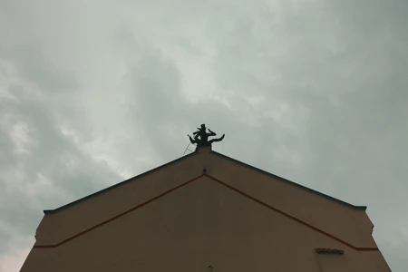 Architectural Silhouette Against Cloudy Sky