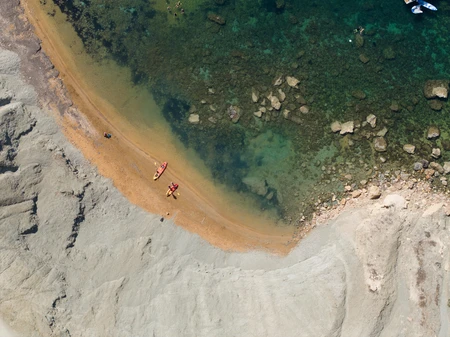 Aerial View of Beach and Kayaks