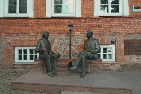 Historical Brick Facade with Sculpture