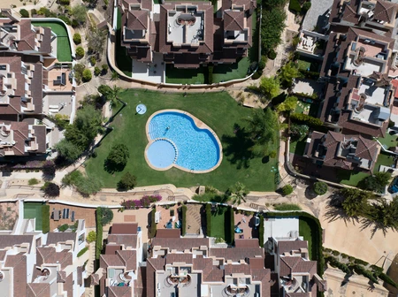 Aerial View of Residential Complex with Pool