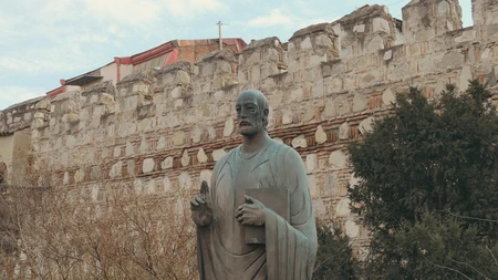 Historic Statue by Ancient Fortress
